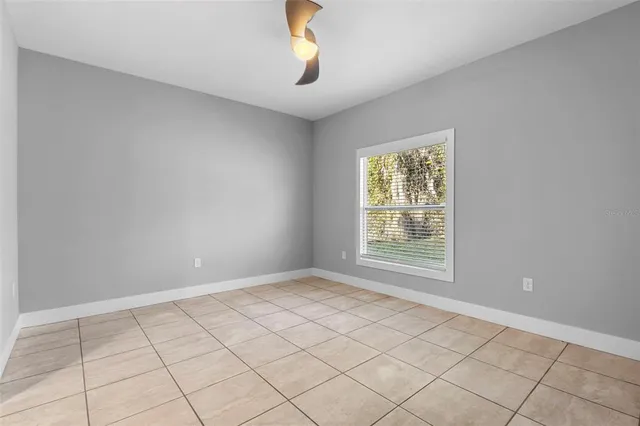 a view of an empty room and window