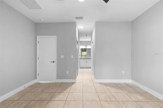 a view of an empty room and window