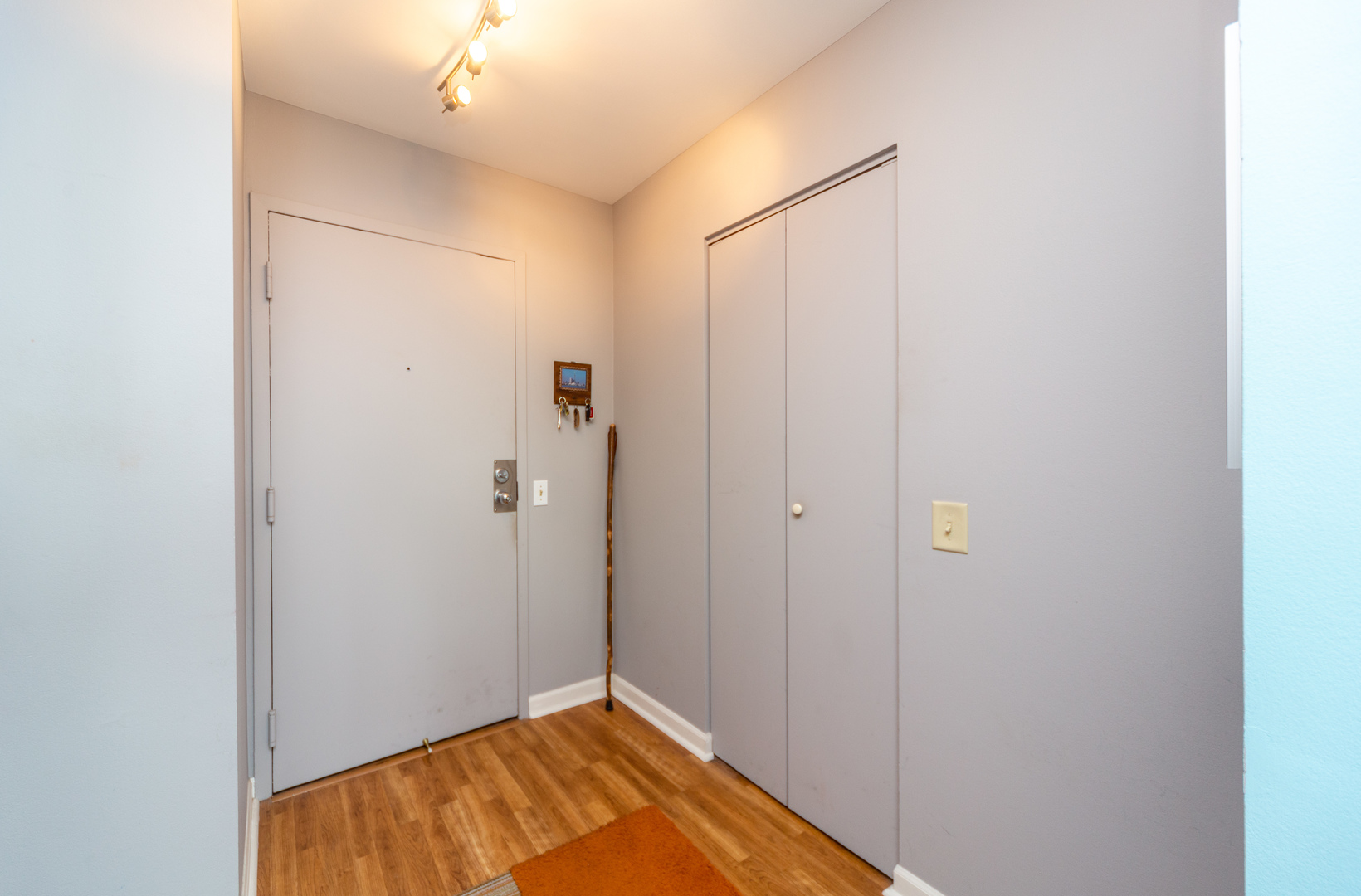 5320 North Sheridan Road, Unit 2401 Chicago, IL 60640 - Photo 2 of 21 a view of a room with wooden floor