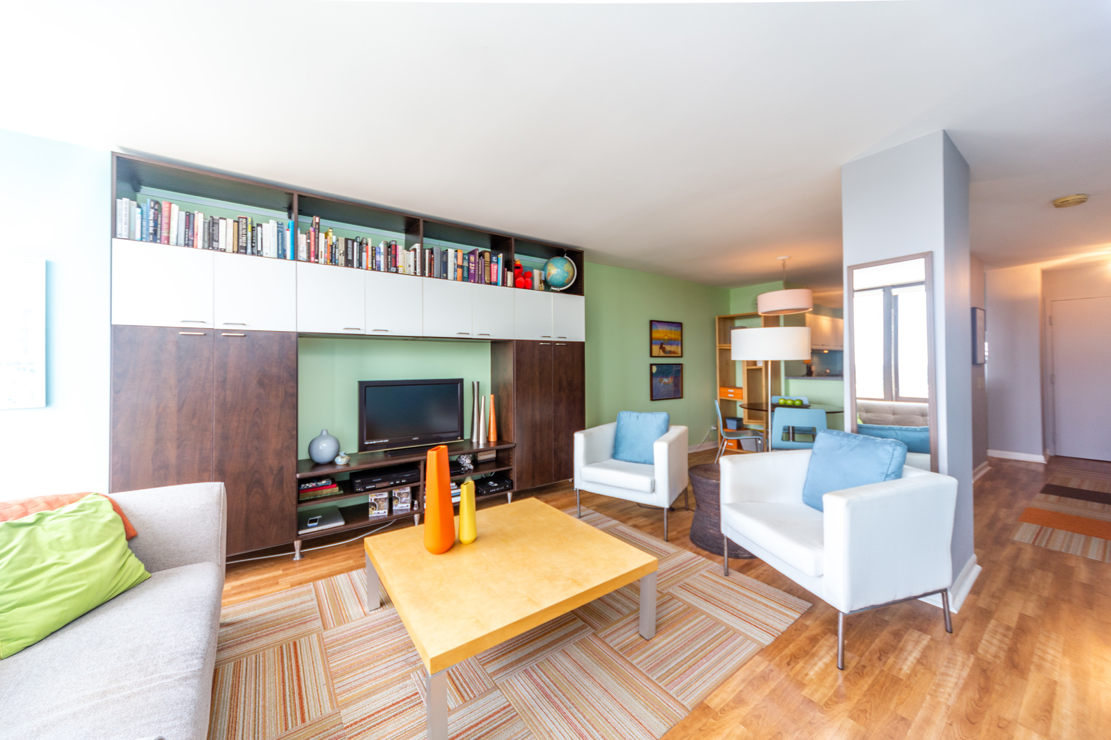 5320 North Sheridan Road, Unit 2401 Chicago, IL 60640 - Photo 6 of 21 a living room with furniture and a fireplace