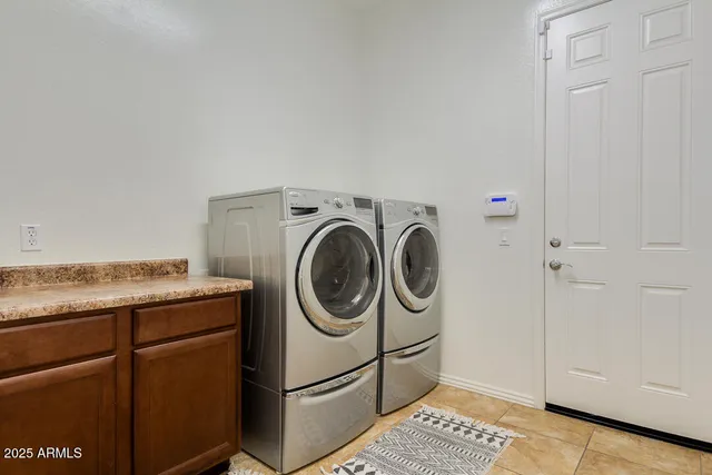 a view of a backyard with sitting area