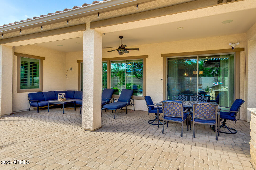 4647 North Aldea Road East Litchfield Park, AZ 85340 - Photo 48 of 49 a view of a house with porch and wooden floor