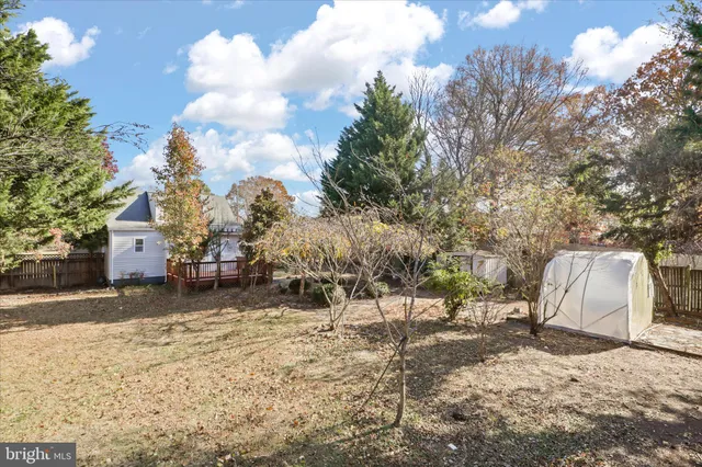 a view of a yard with a snow on the road