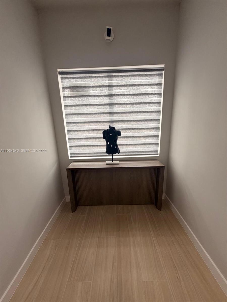 2436 Southwest 7th Street, Unit 3 Miami, FL 33135 - Photo 13 of 17 a view of a room with a small cabin