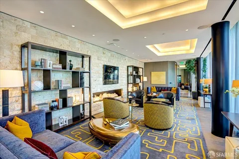 a room with furniture and a floor to ceiling window