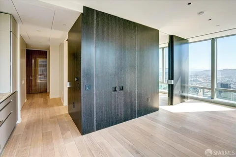 a view of a bathroom from a hallway