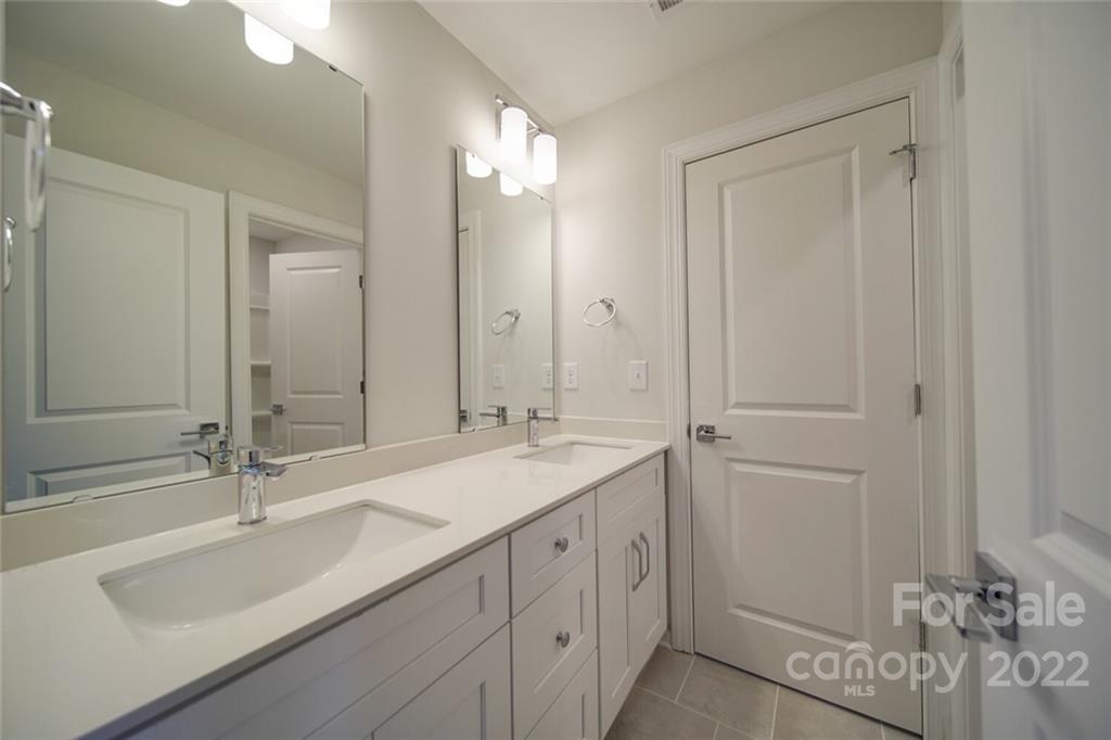 1339 Reservation Road Rock Hill, SC 29730 - Photo 38 of 44 a bathroom with a sink and a mirror