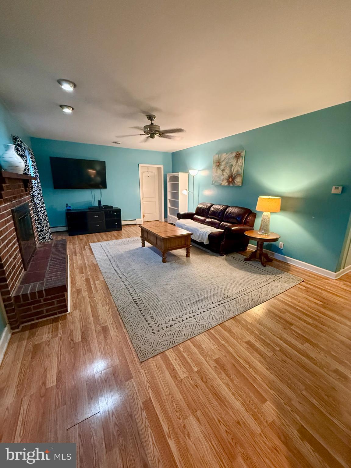 1608 Columbus Road Burlington, NJ 08016 - Photo 6 of 20 Inviting living space with vibrant blue walls.