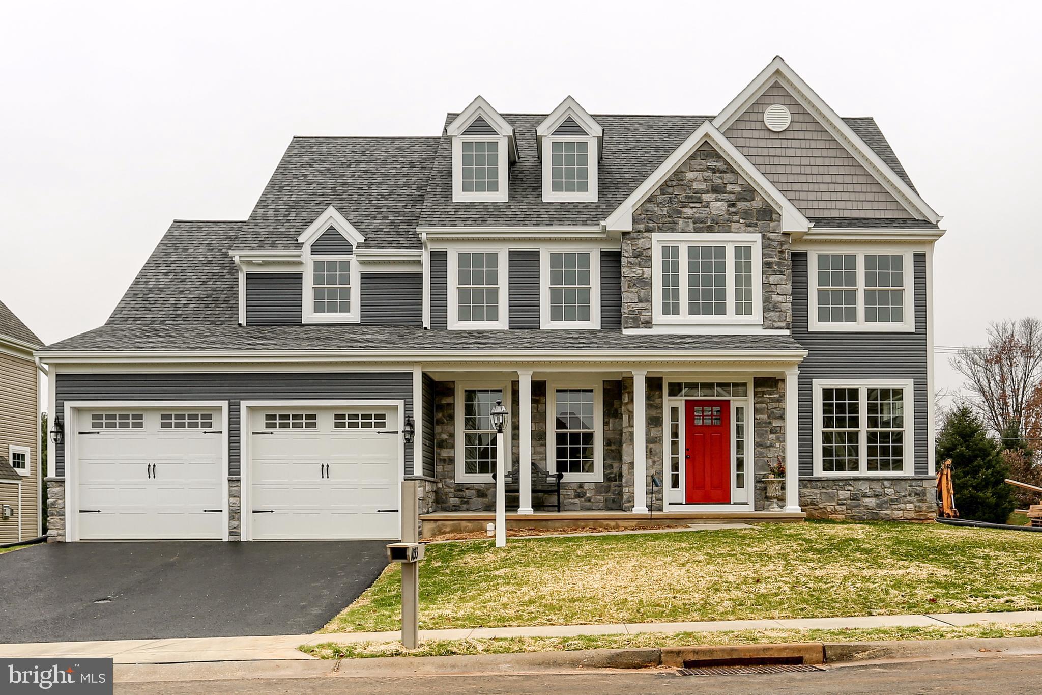 Stunning view from the street.   Two car garage.