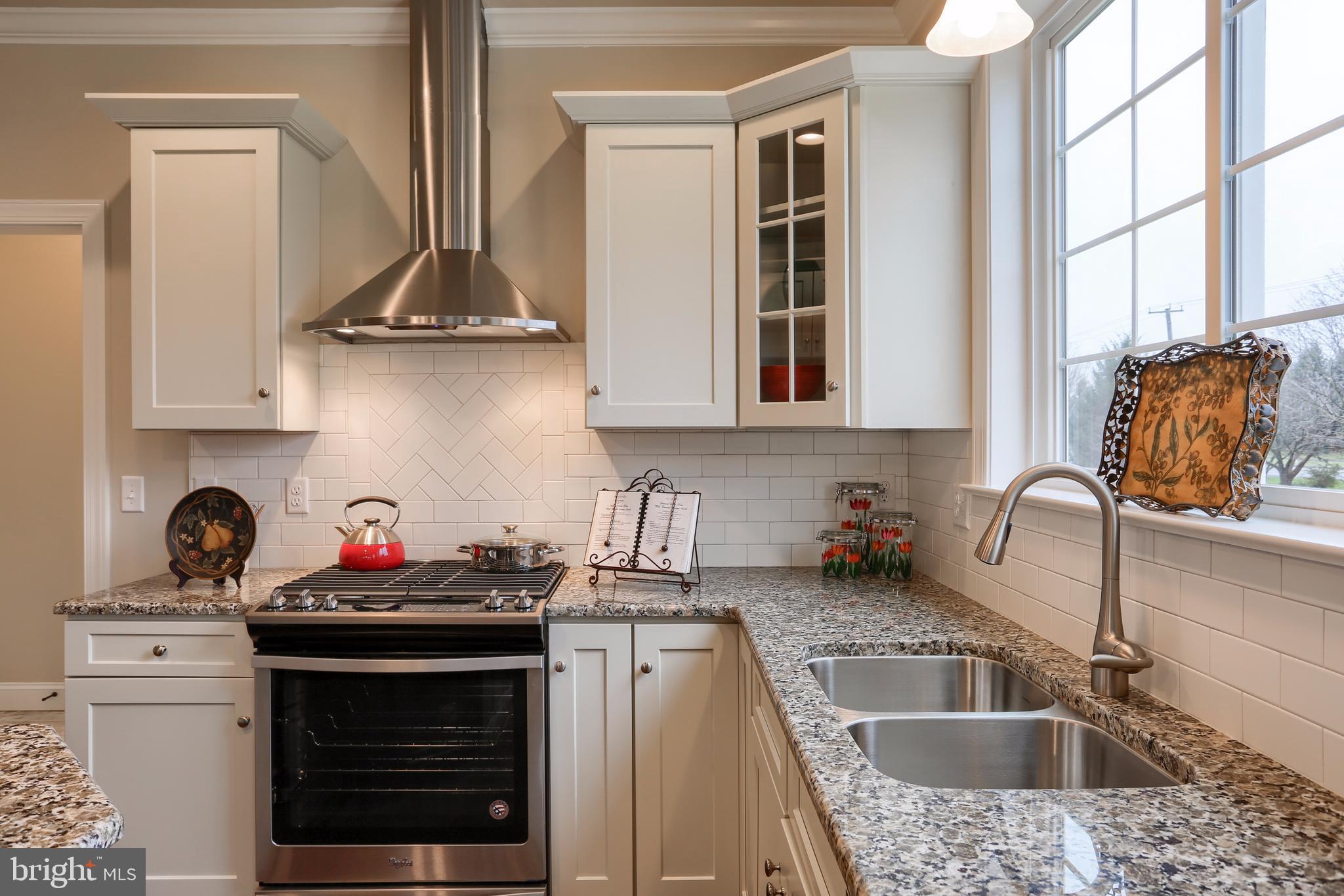 1033 Suffolk Drive Lititz, PA 17543 - Photo 20 of 45 Beautiful tile backsplash. Decorative range hood.