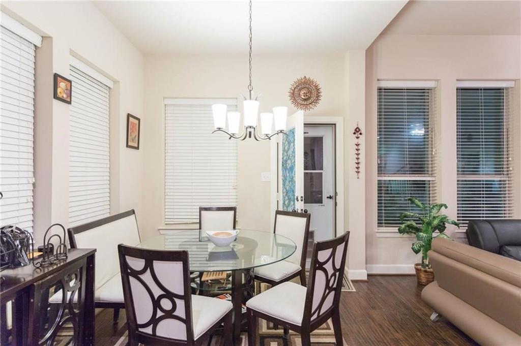 423 Palacio Street Irving, TX 75039 - Photo 16 of 18 Dining space with dark wood-style floors and a chandelier