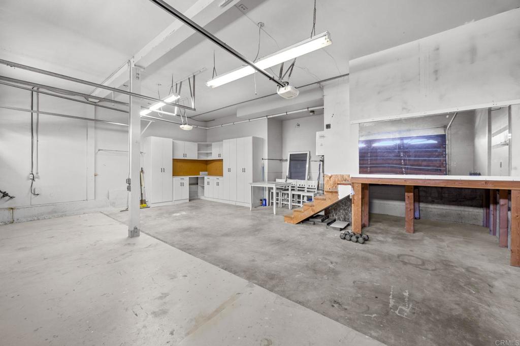 1561 Neptune Avenue Encinitas, CA 92024 - Photo 23 of 30 a room with gym equipment