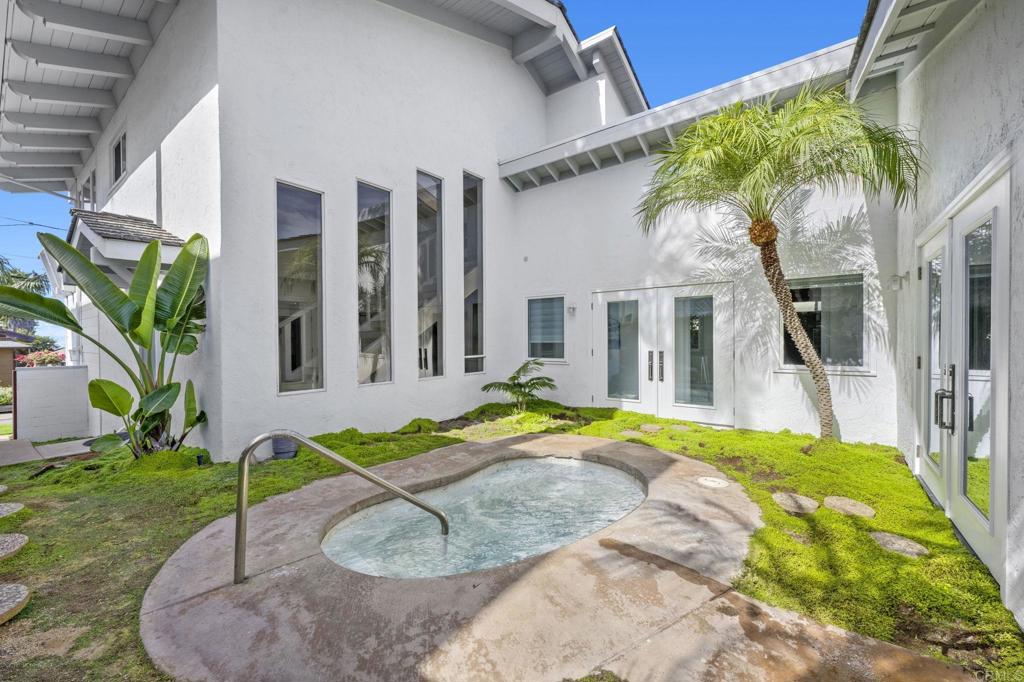 1561 Neptune Avenue Encinitas, CA 92024 - Photo 25 of 30 a view of a house with backyard