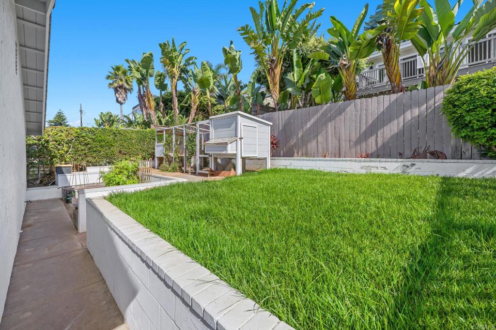 1561 Neptune Avenue Encinitas, CA 92024 - Photo 27 of 30 a view of a backyard with sitting area