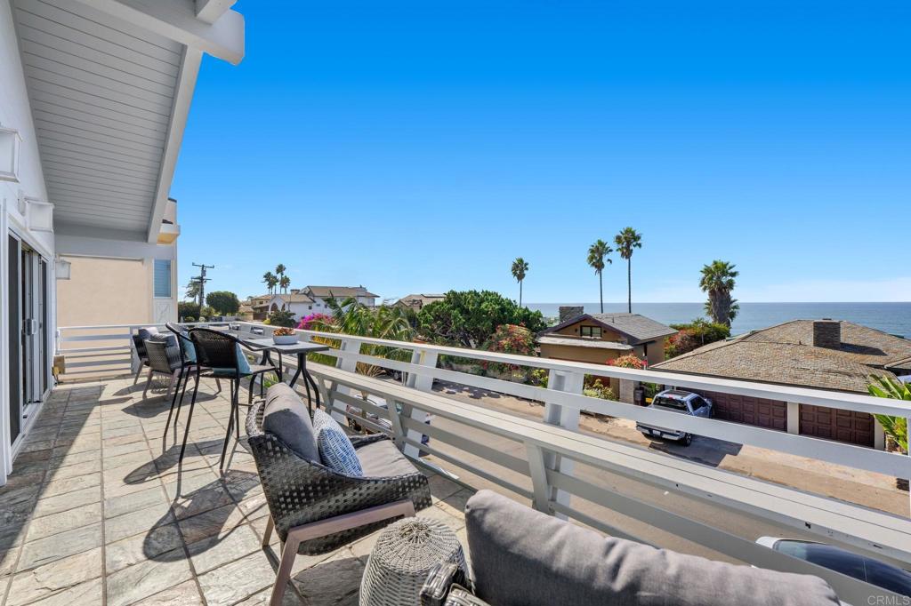 1561 Neptune Avenue Encinitas, CA 92024 - Photo 30 of 30 a view of a terrace with furniture and outdoor seating
