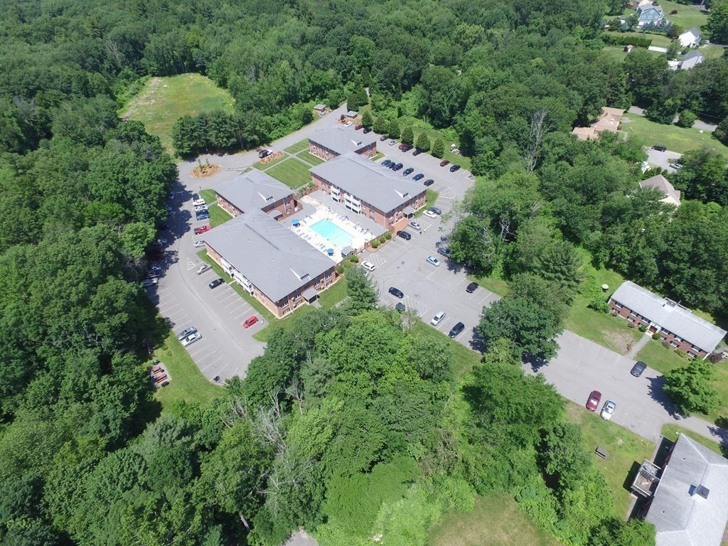 72 Leonard Road, Unit 72 Boxborough, MA 01719 - Photo 1 of 25 an aerial view of a house with outdoor space and street view
