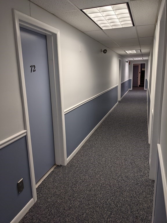 72 Leonard Road, Unit 72 Boxborough, MA 01719 - Photo 17 of 25 an empty room with windows