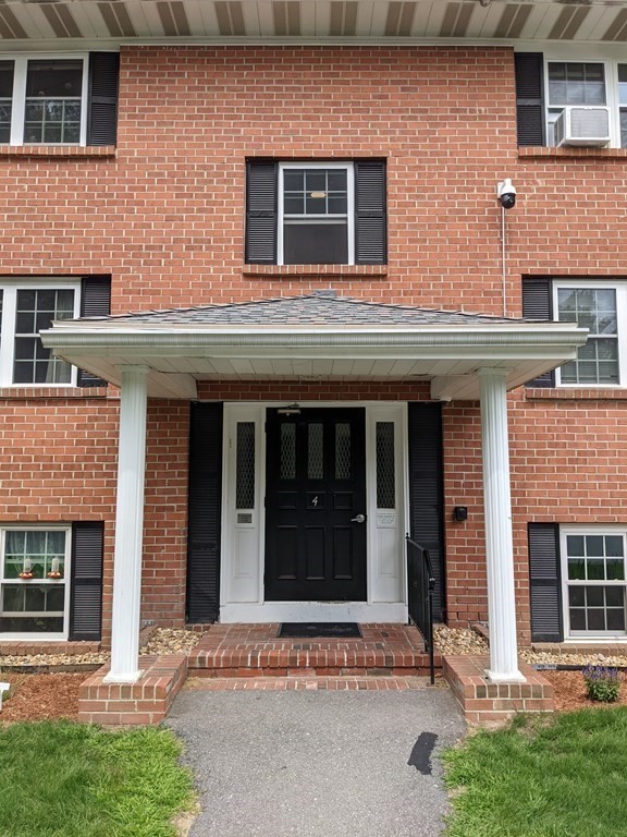 72 Leonard Road, Unit 72 Boxborough, MA 01719 - Photo 3 of 25 an entrance to house with yard