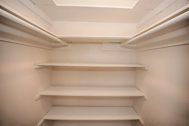 a bathroom with a white bathtub