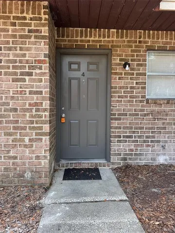 a view of a entryway door of house