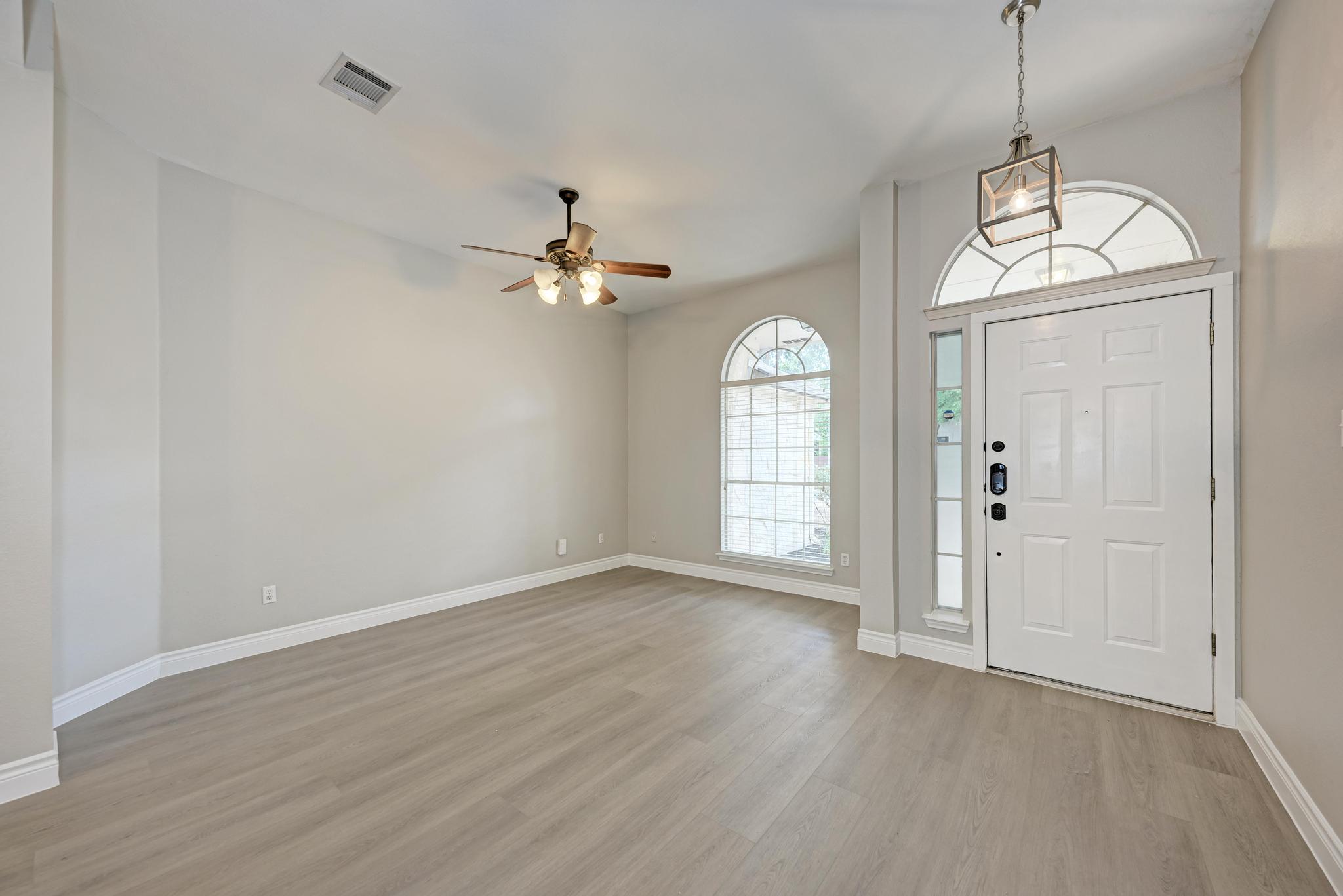 4408 Tello Path Austin, TX 78749 - Photo 4 of 38 Foyer entrance featuring light wood-style flooring and a ceiling fan