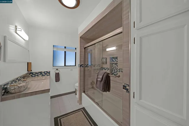 a view of a street with a tree