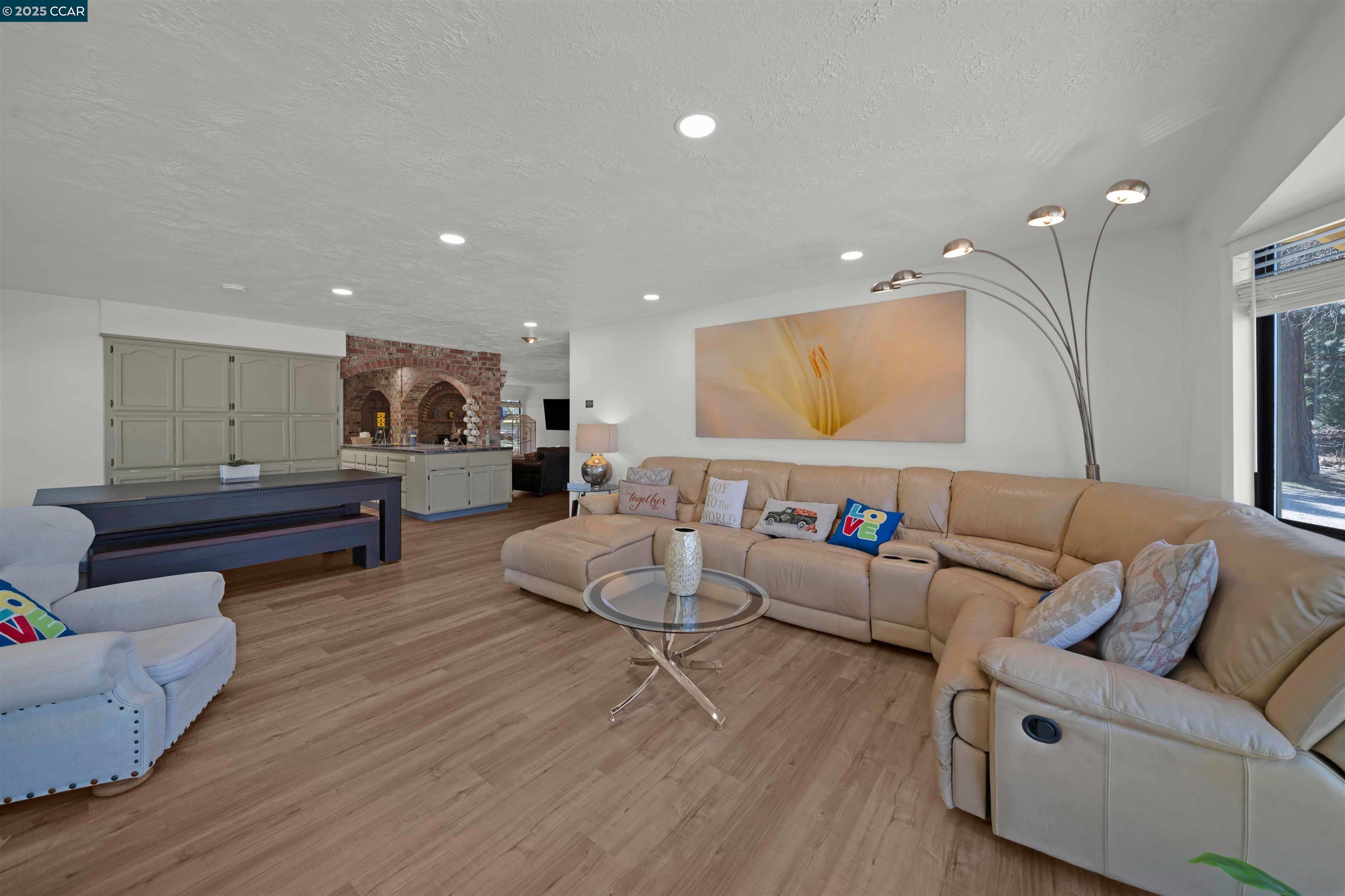 1324 Alves Road Weed, CA 96094 - Photo 4 of 58 a living room with furniture and a wooden floor