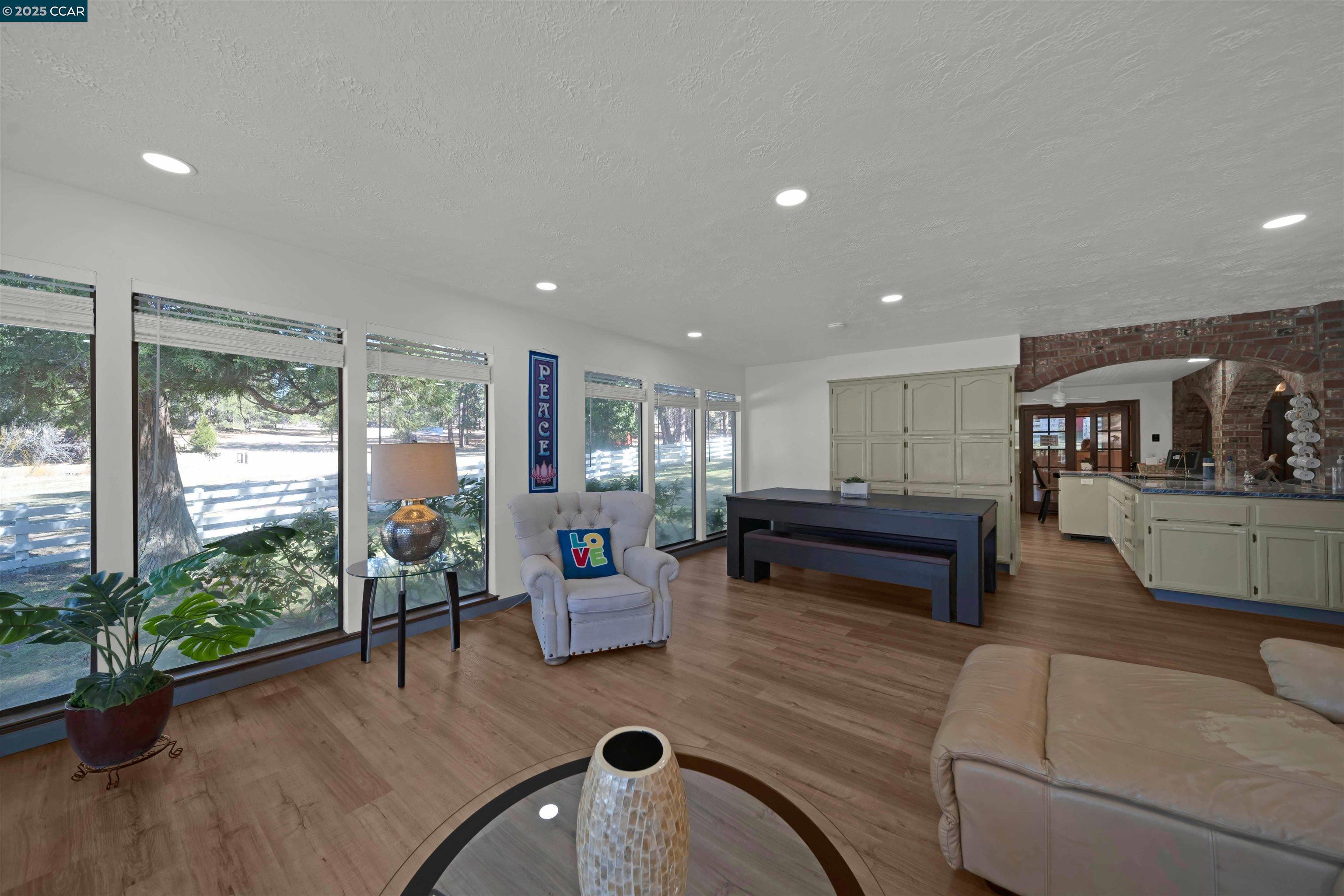 1324 Alves Road Weed, CA 96094 - Photo 7 of 58 a living room with furniture and a wooden floor