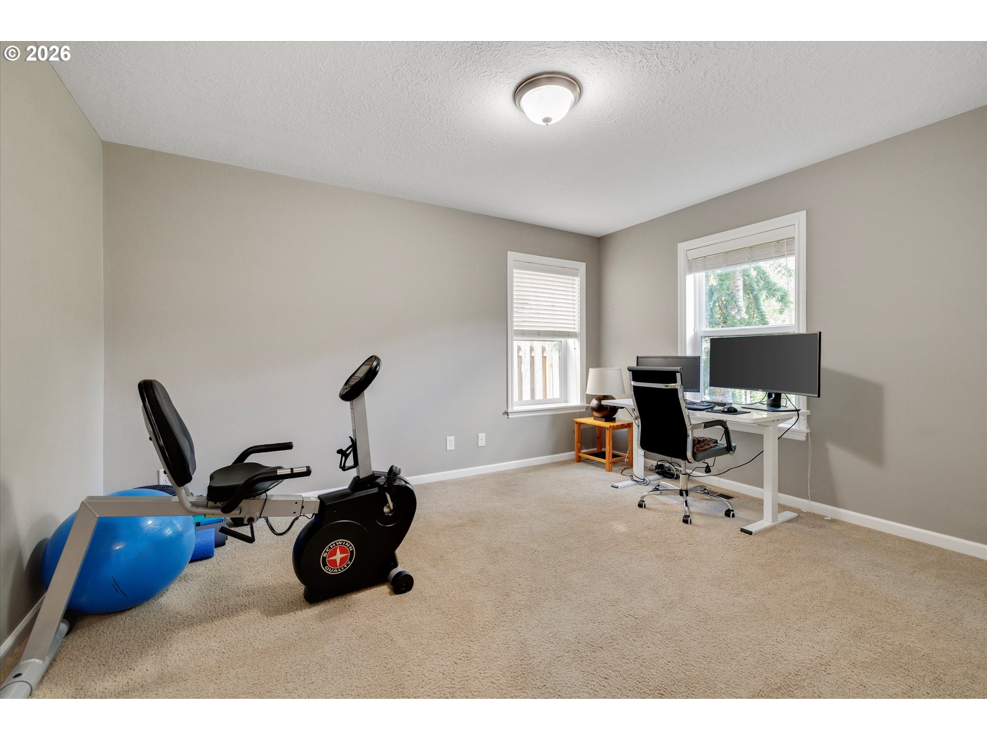 3769 10th Street Hubbard, OR 97032 - Photo 31 of 47 a view of a workspace with furniture and a window