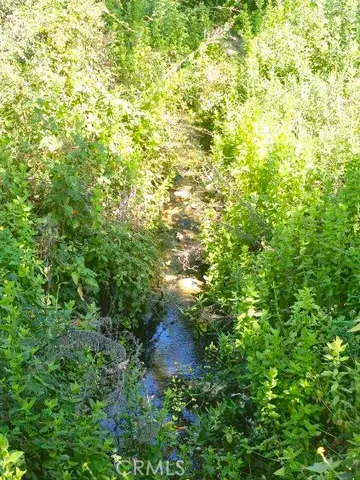 a view of outdoor space and green field
