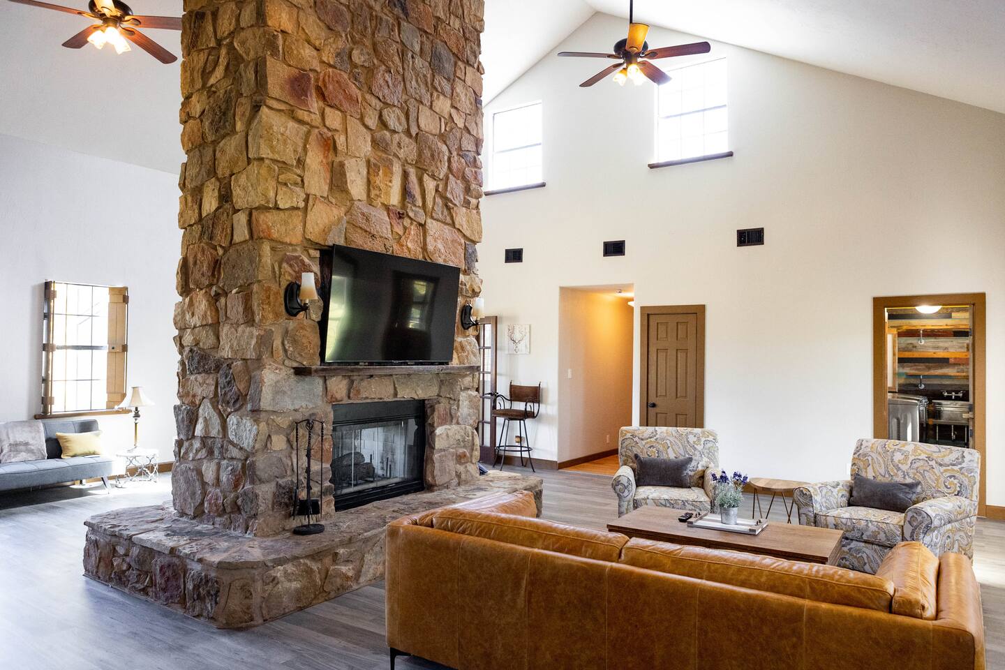 1901 Harmon Hills Road Dripping Springs, TX 78620 - Photo 16 of 27 a living room with furniture and a fireplace