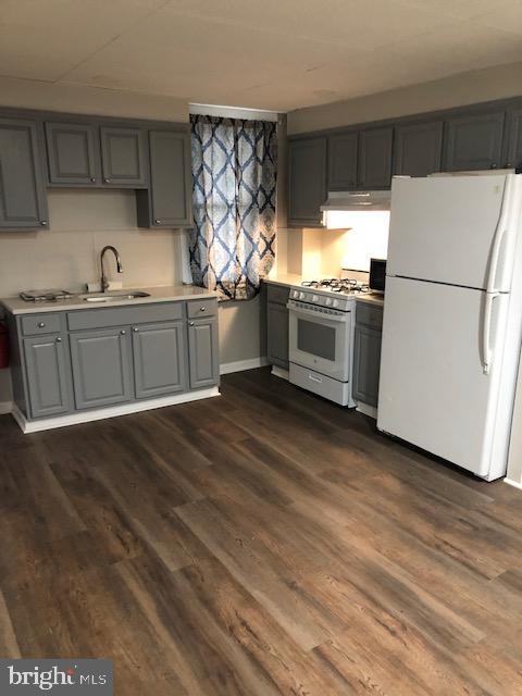 2208 Good Intent Road Deptford, NJ 08096 - Photo 5 of 6 a kitchen with a refrigerator stove and sink