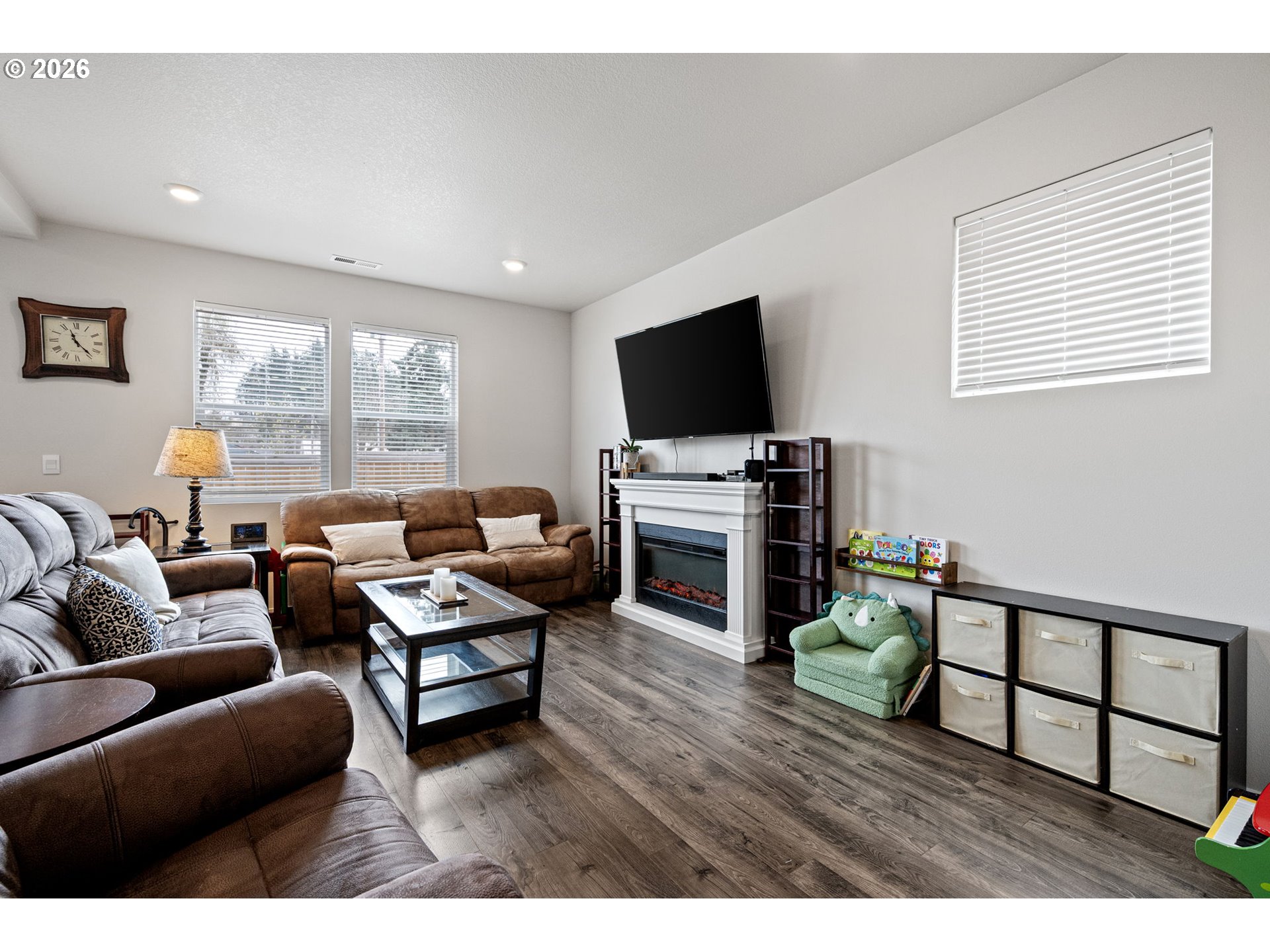 2259 30th Place Springfield, OR 97477 - Photo 12 of 48 a living room with furniture and a flat screen tv