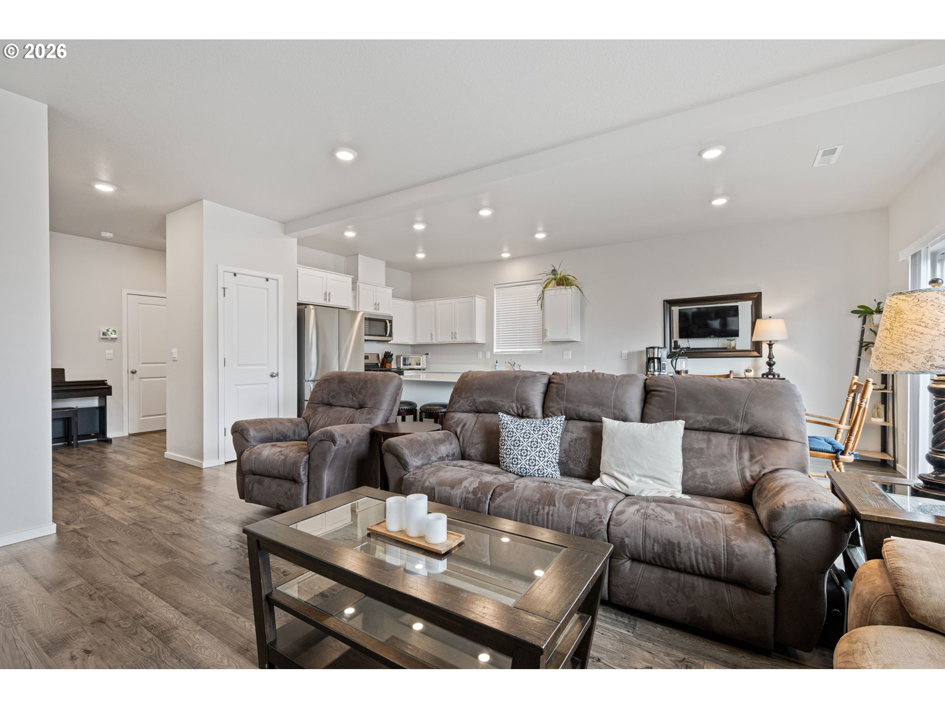 2259 30th Place Springfield, OR 97477 - Photo 16 of 48 a living room with furniture and a flat screen tv