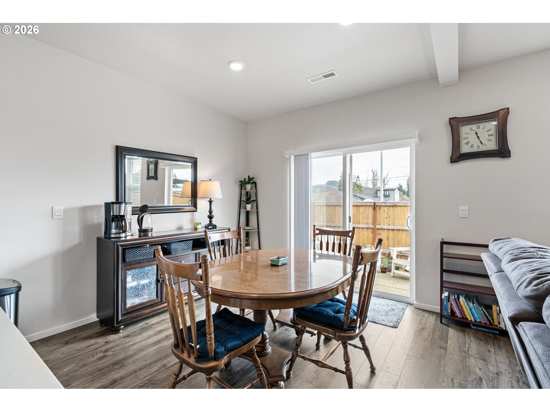2259 30th Place Springfield, OR 97477 - Photo 19 of 48 a view of a dining room with furniture and wooden floor
