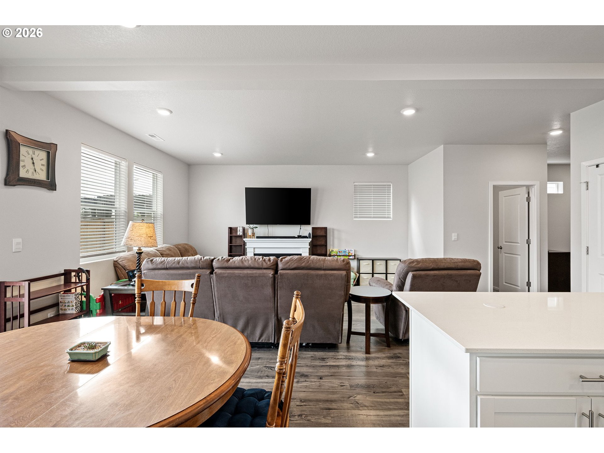 2259 30th Place Springfield, OR 97477 - Photo 24 of 48 a living room with furniture a flat screen tv and kitchen view