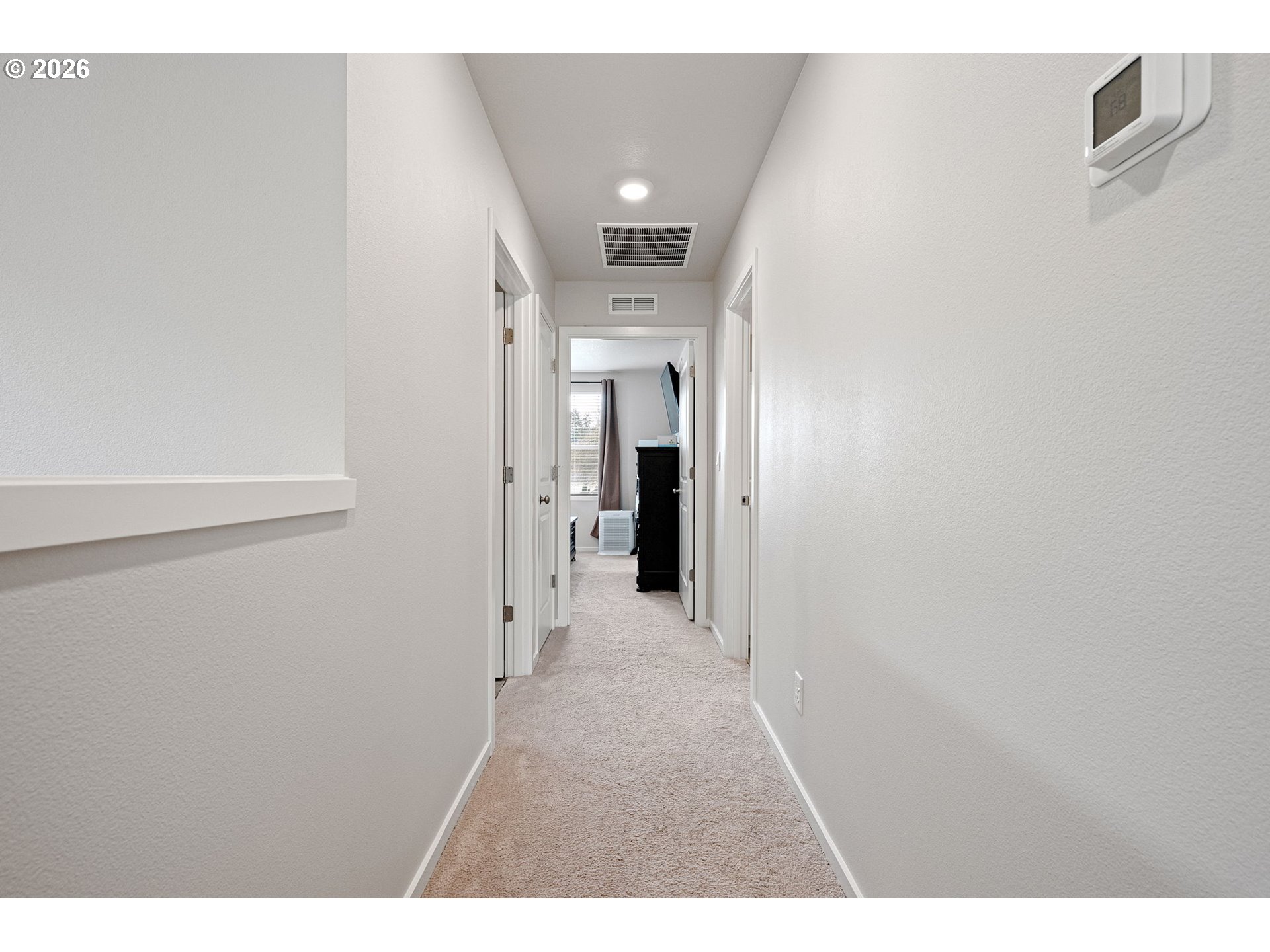 2259 30th Place Springfield, OR 97477 - Photo 26 of 48 a view of a hallway with wooden shelves