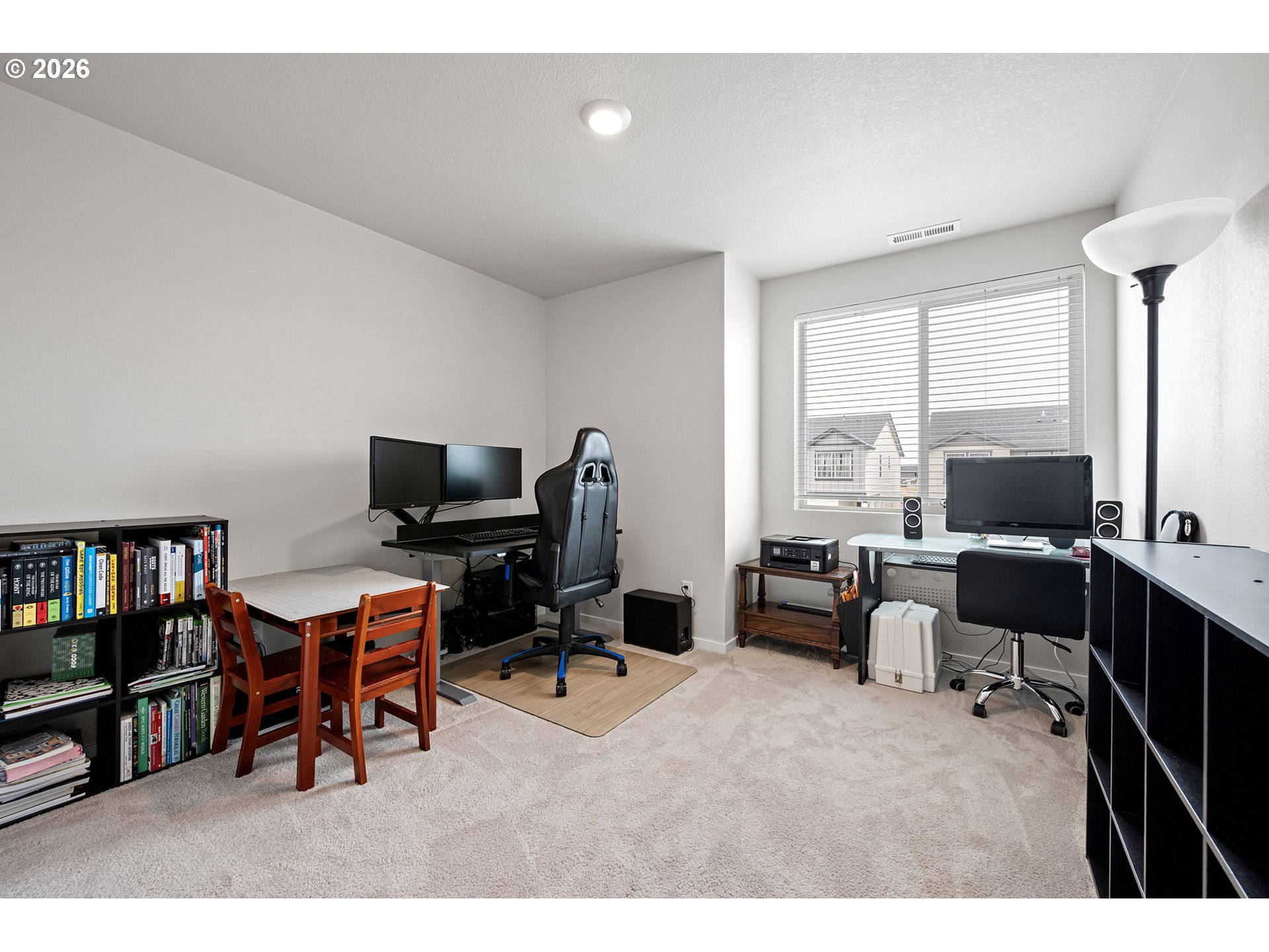 2259 30th Place Springfield, OR 97477 - Photo 41 of 48 a view of a livingroom with workspace and a window
