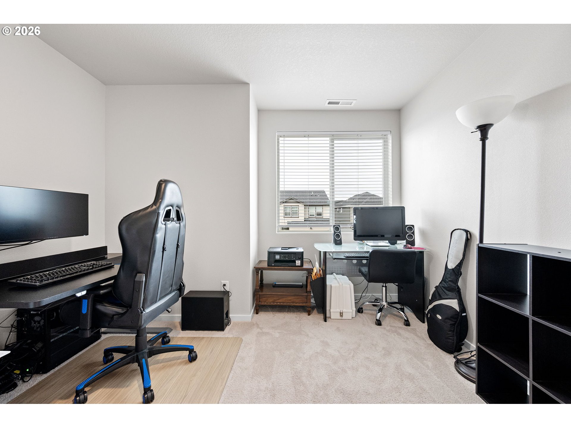 2259 30th Place Springfield, OR 97477 - Photo 42 of 48 a view of a workspace with furniture and a window