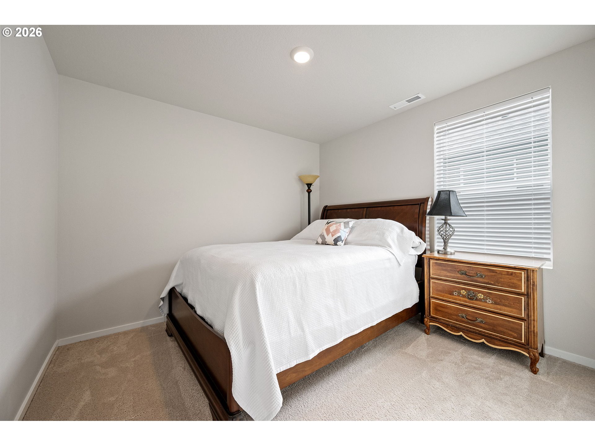 2259 30th Place Springfield, OR 97477 - Photo 44 of 48 a bedroom with a bed and a cabinets