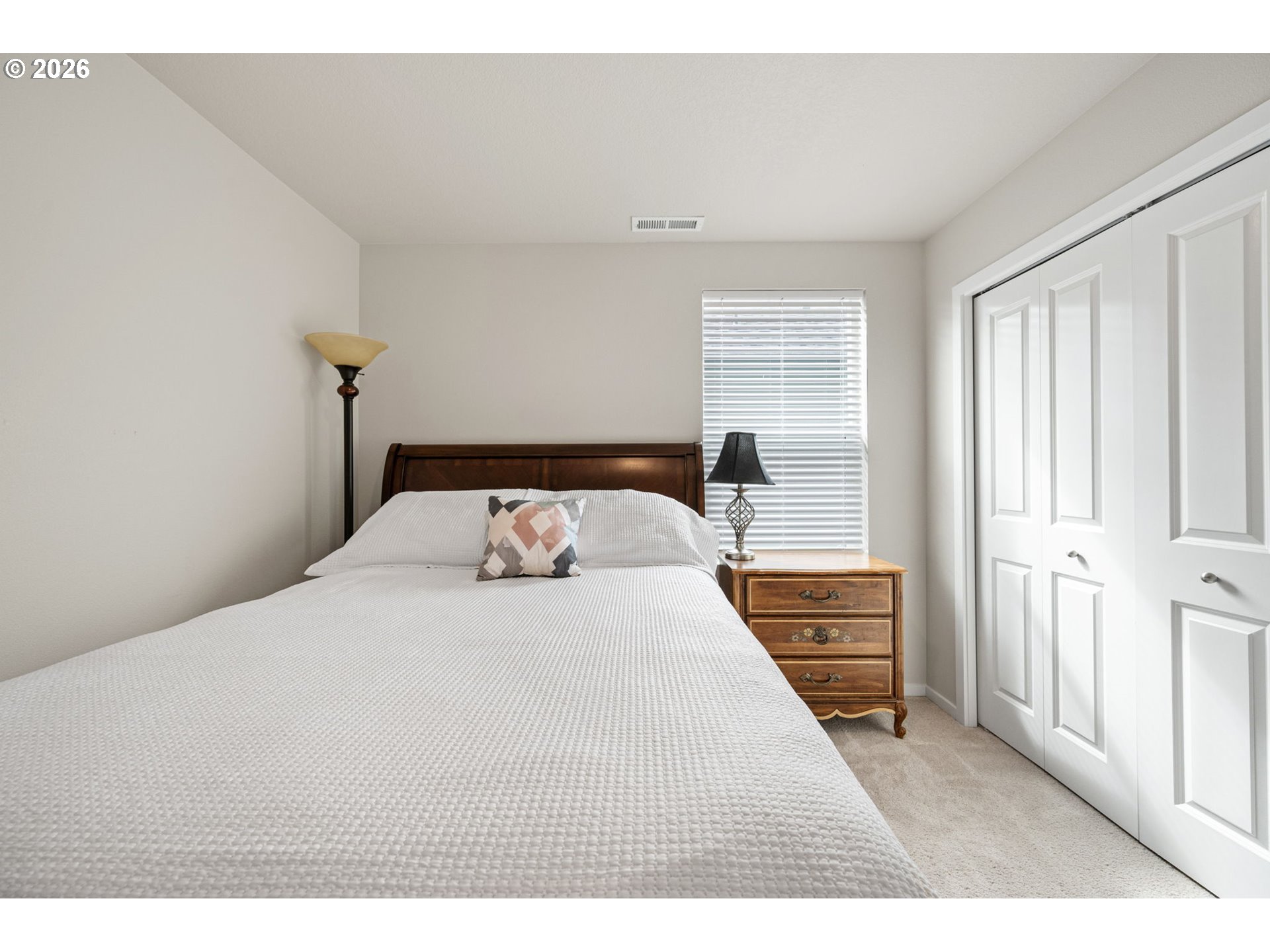 2259 30th Place Springfield, OR 97477 - Photo 45 of 48 a bedroom with a bed and a window