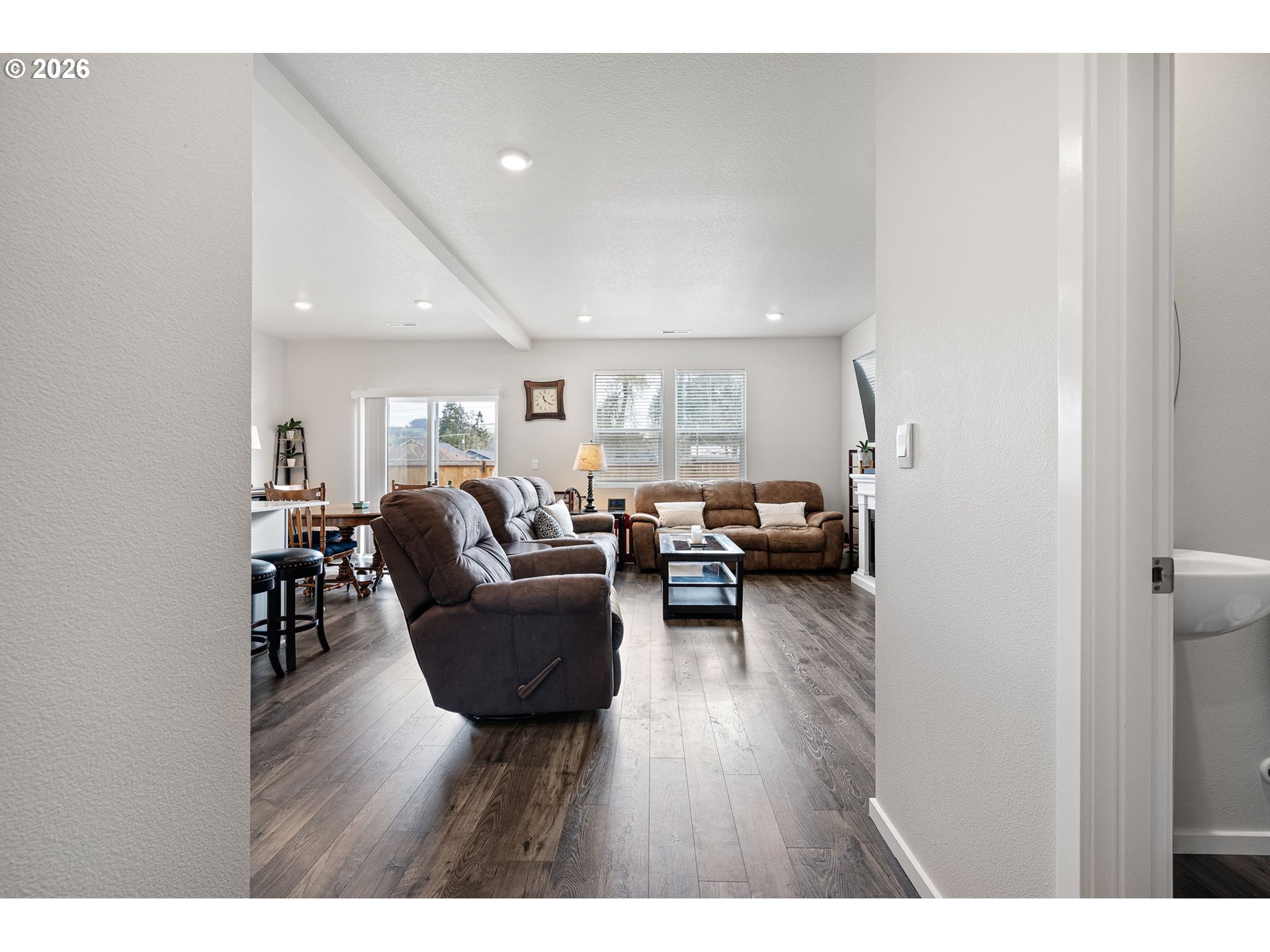 2259 30th Place Springfield, OR 97477 - Photo 9 of 48 a living room with furniture and a wooden floor