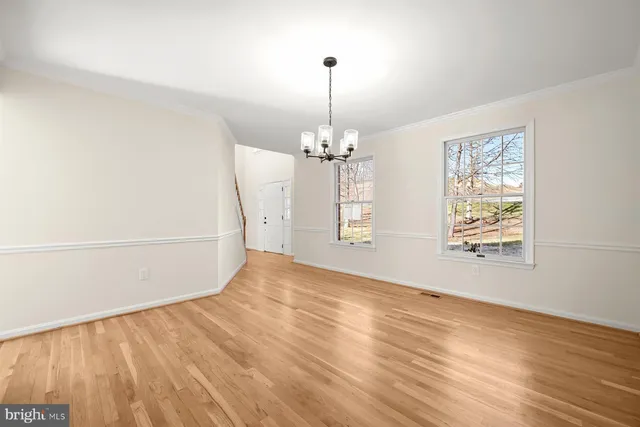 a kitchen with stainless steel appliances a refrigerator sink and stove top oven
