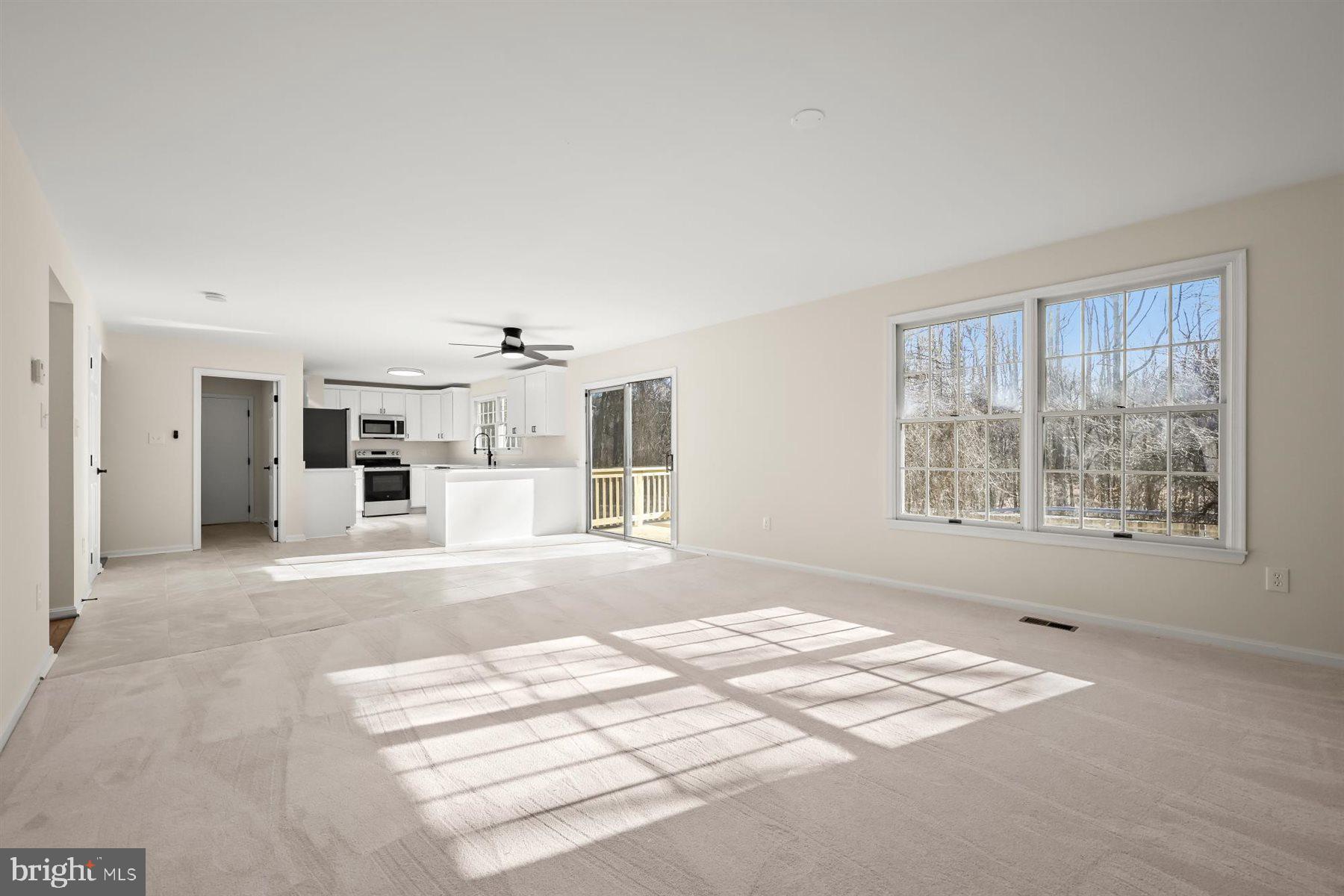 13121 Old Fletchertown Road Bowie, MD 20720 - Photo 34 of 91 a view of a livingroom with a staircase