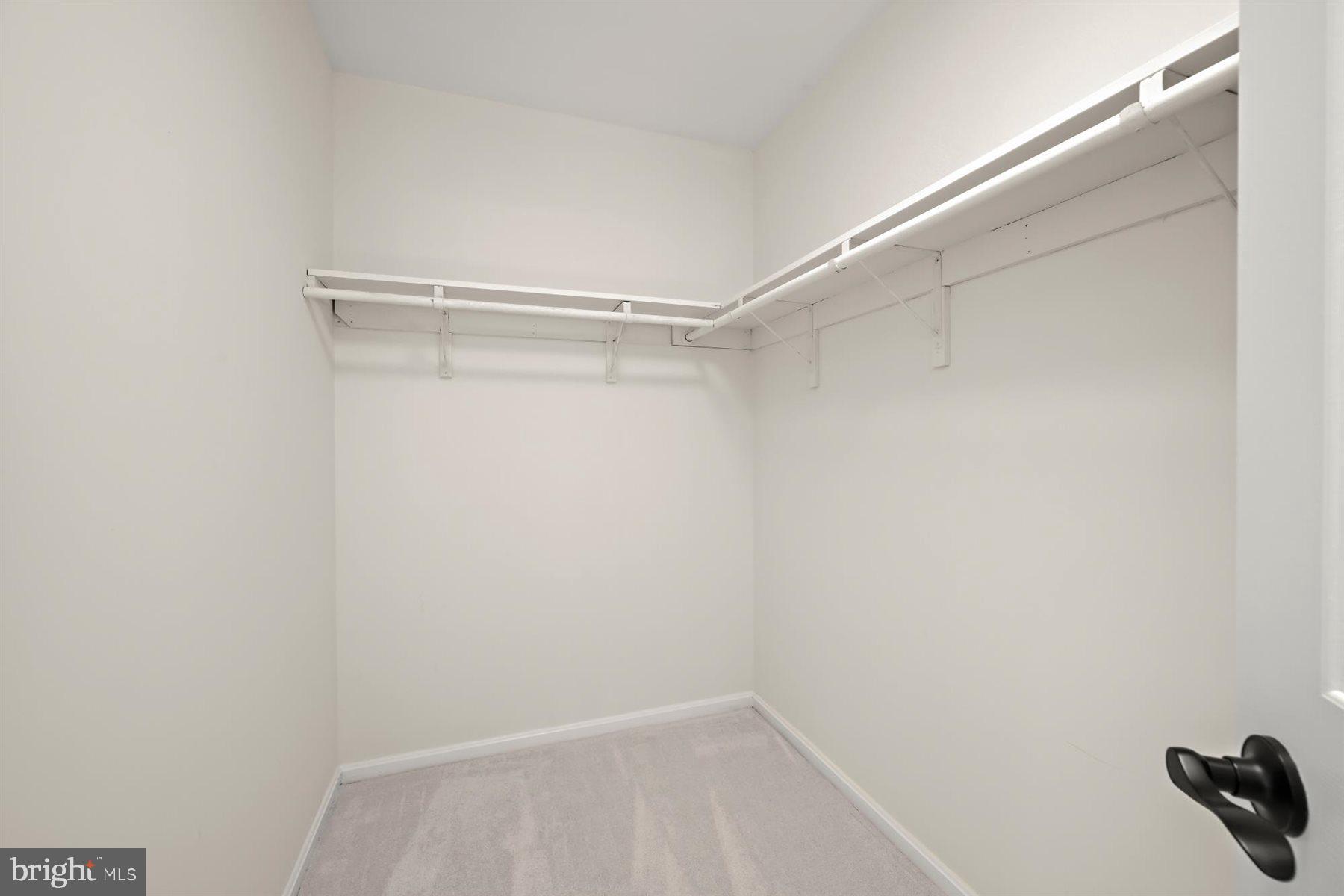 13121 Old Fletchertown Road Bowie, MD 20720 - Photo 41 of 91 a view of a room with racks on the wall