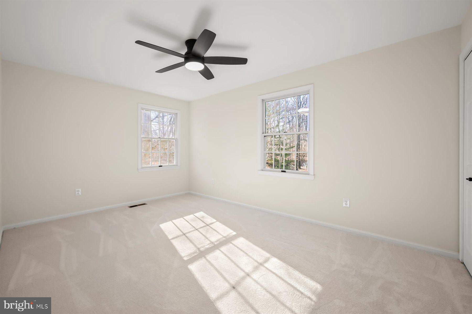 13121 Old Fletchertown Road Bowie, MD 20720 - Photo 50 of 91 a view of an empty room and a window