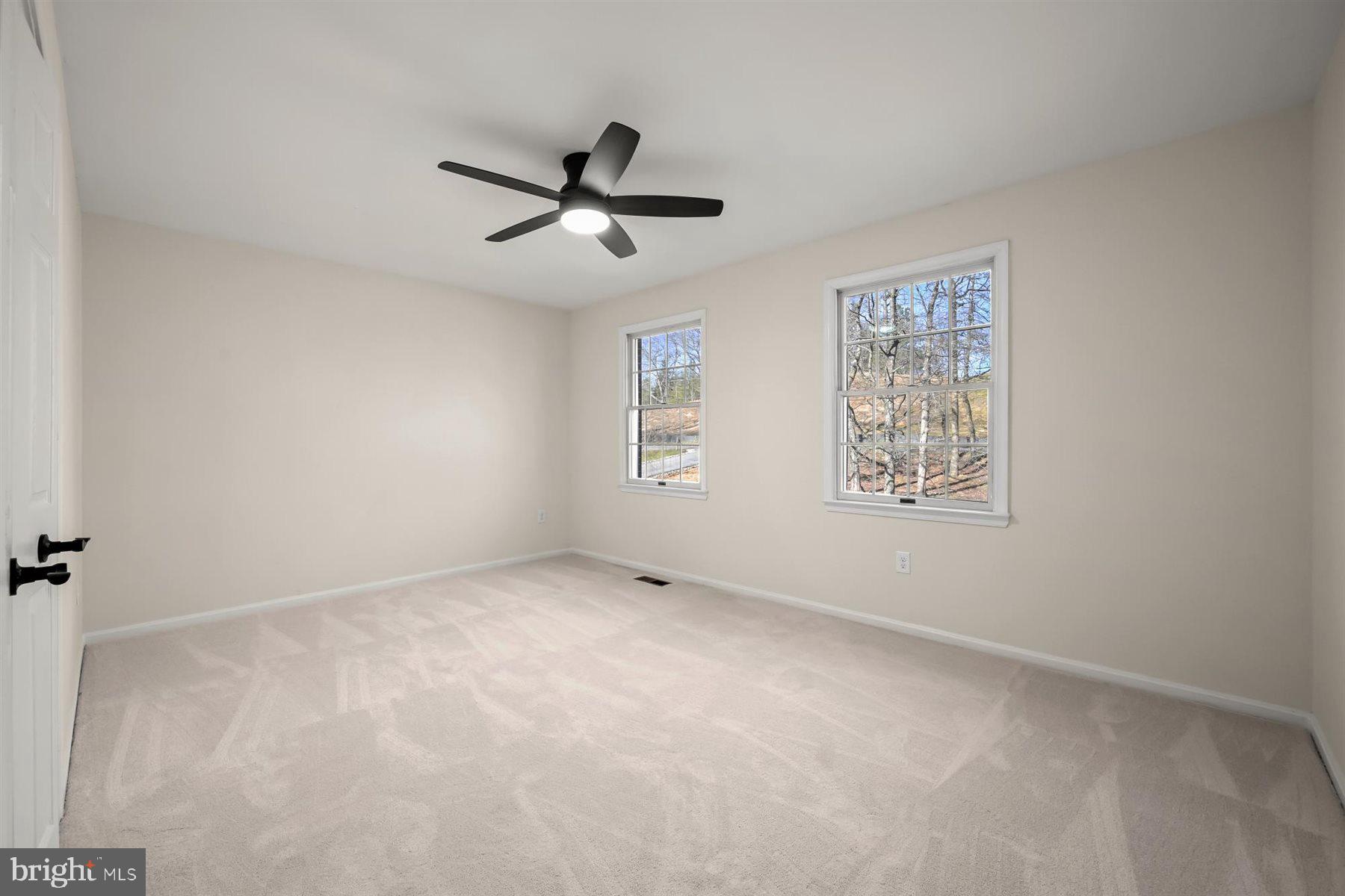 13121 Old Fletchertown Road Bowie, MD 20720 - Photo 53 of 91 a view of an empty room with a window