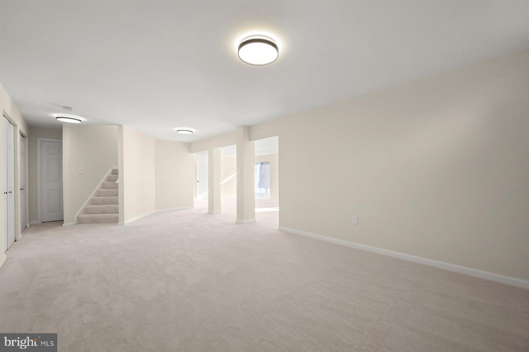 13121 Old Fletchertown Road Bowie, MD 20720 - Photo 59 of 91 a view of an empty room with a kitchen