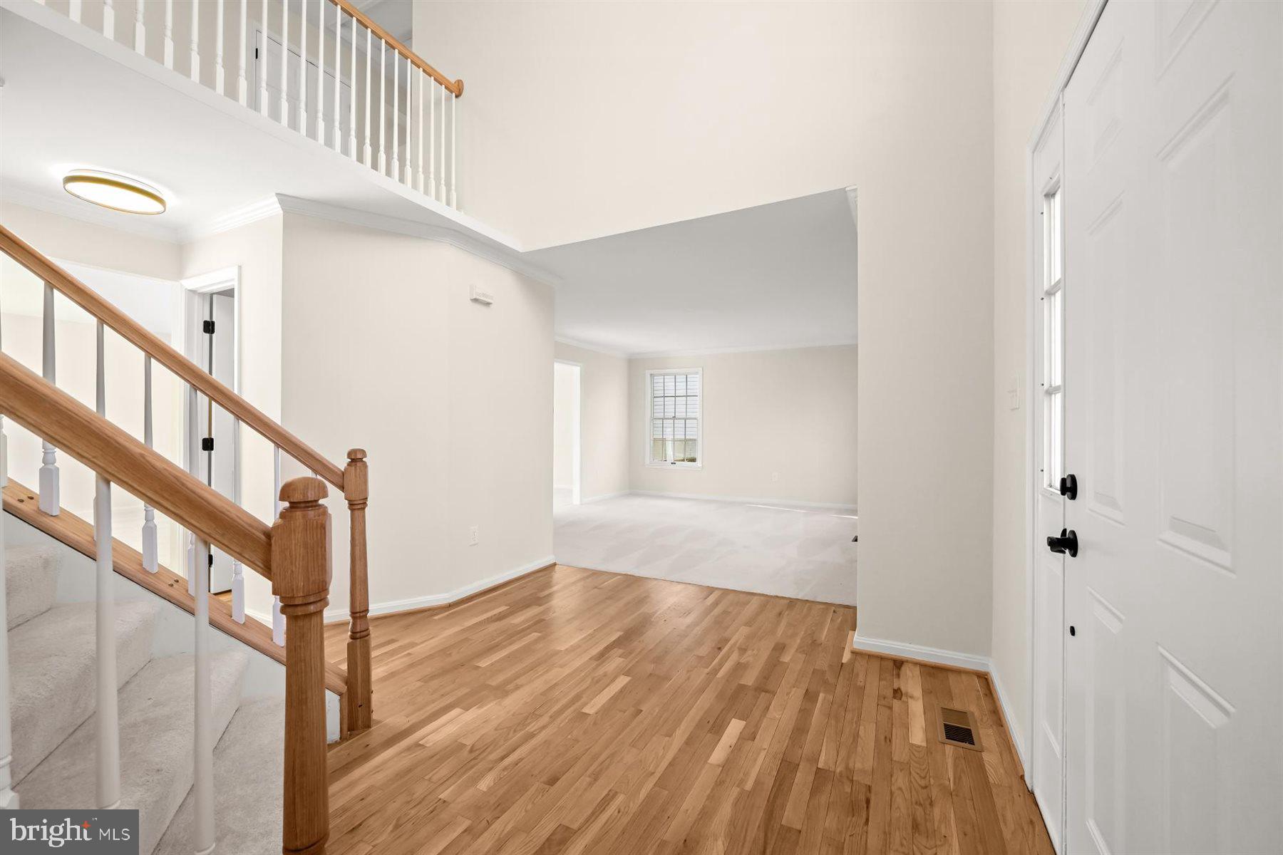 13121 Old Fletchertown Road Bowie, MD 20720 - Photo 7 of 91 a view of entryway with wooden floor