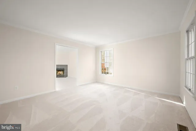 an empty room with windows